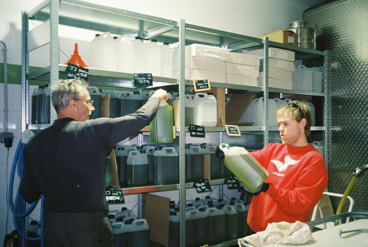 filling bidons at the moulin